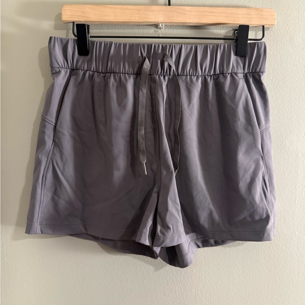 Gray Athletic Shorts with Drawstring Closure and Mid-Thigh Length